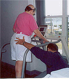 Trying treadmill at .1 mph with therapist guiding right hip, etc.